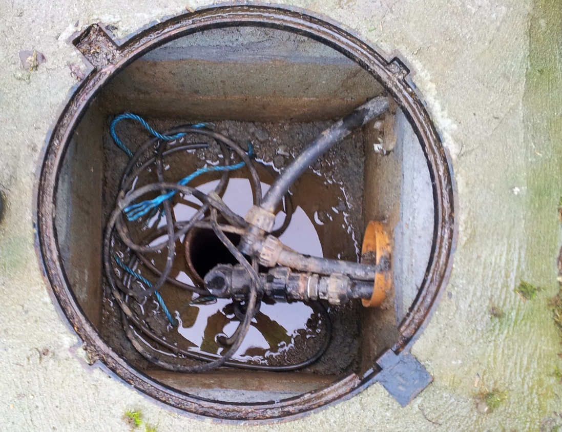 An image of a water well head: Assess if your private well is at risk of contamination